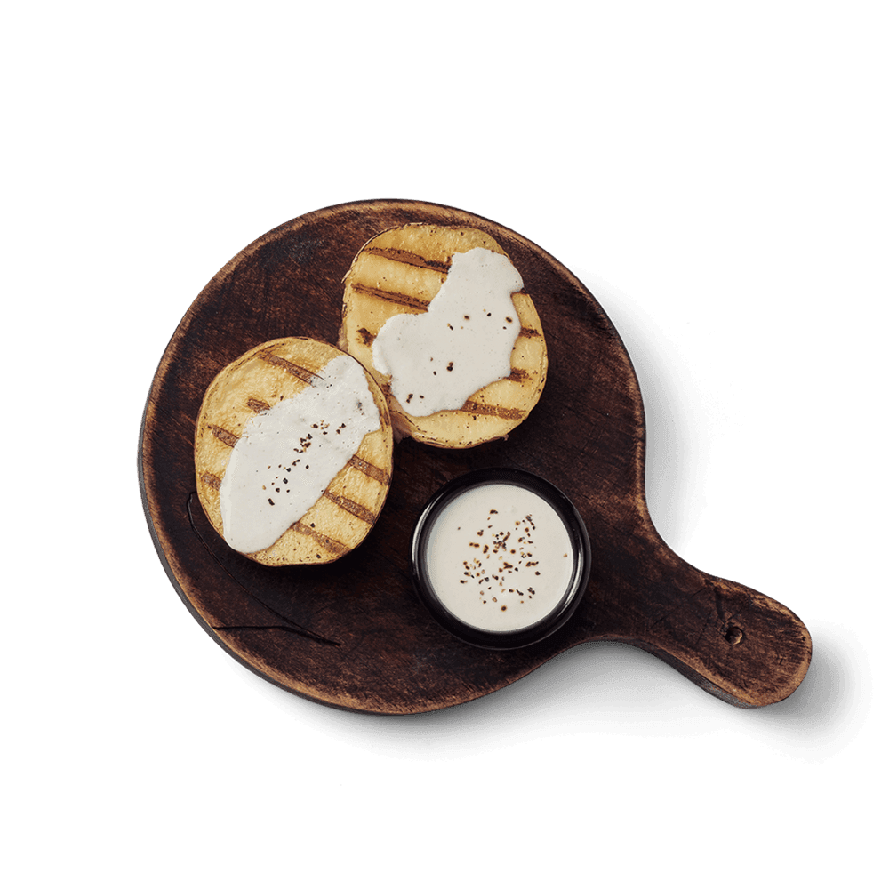 Porción de papas asadas